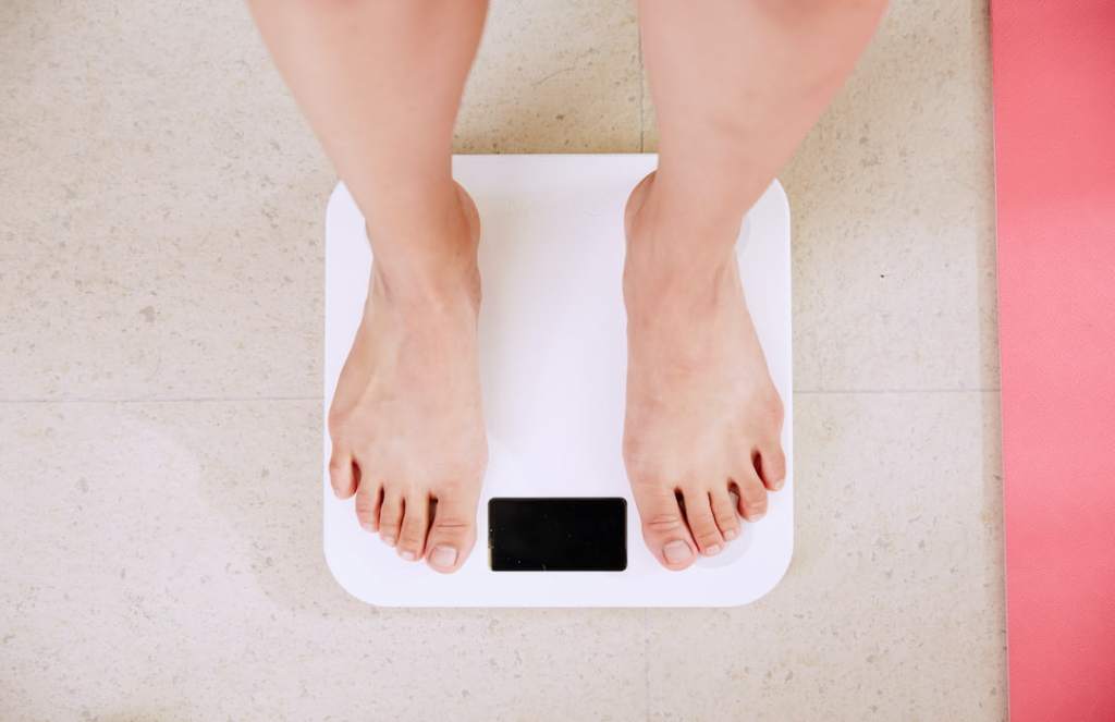 How does grief affect weight gain or loss?