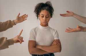 Woman being scolded by many people