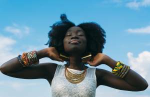 Woman touching her hair on a sunny day