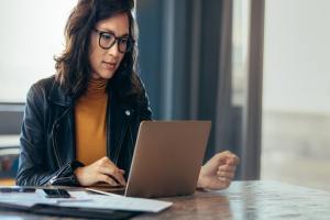 Woman sitting at a computer