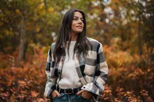 Woman in the woods in fall