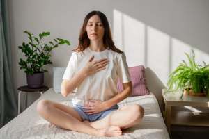 Woman doing breathing exercises